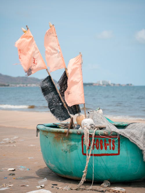 Darmowe zdjęcie z galerii z łódź, morze, piasek