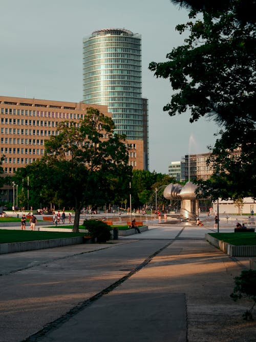 A large building with a clock tower in the background