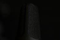 Black and Silver Microphone on Black Background