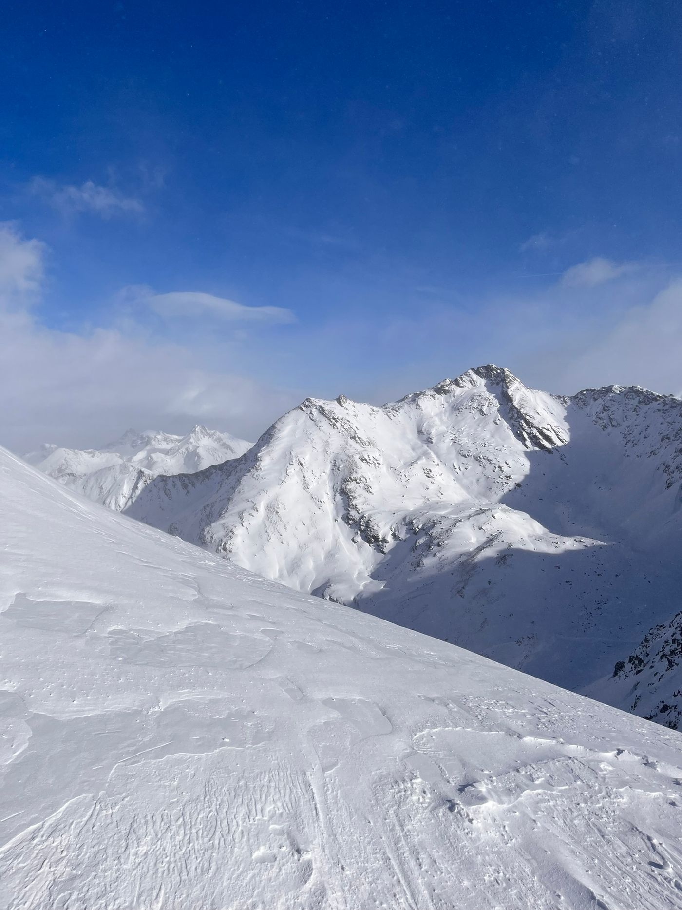 Snow-covered mountains above St Anton am Arlberg, Tyrol, under a clear sky