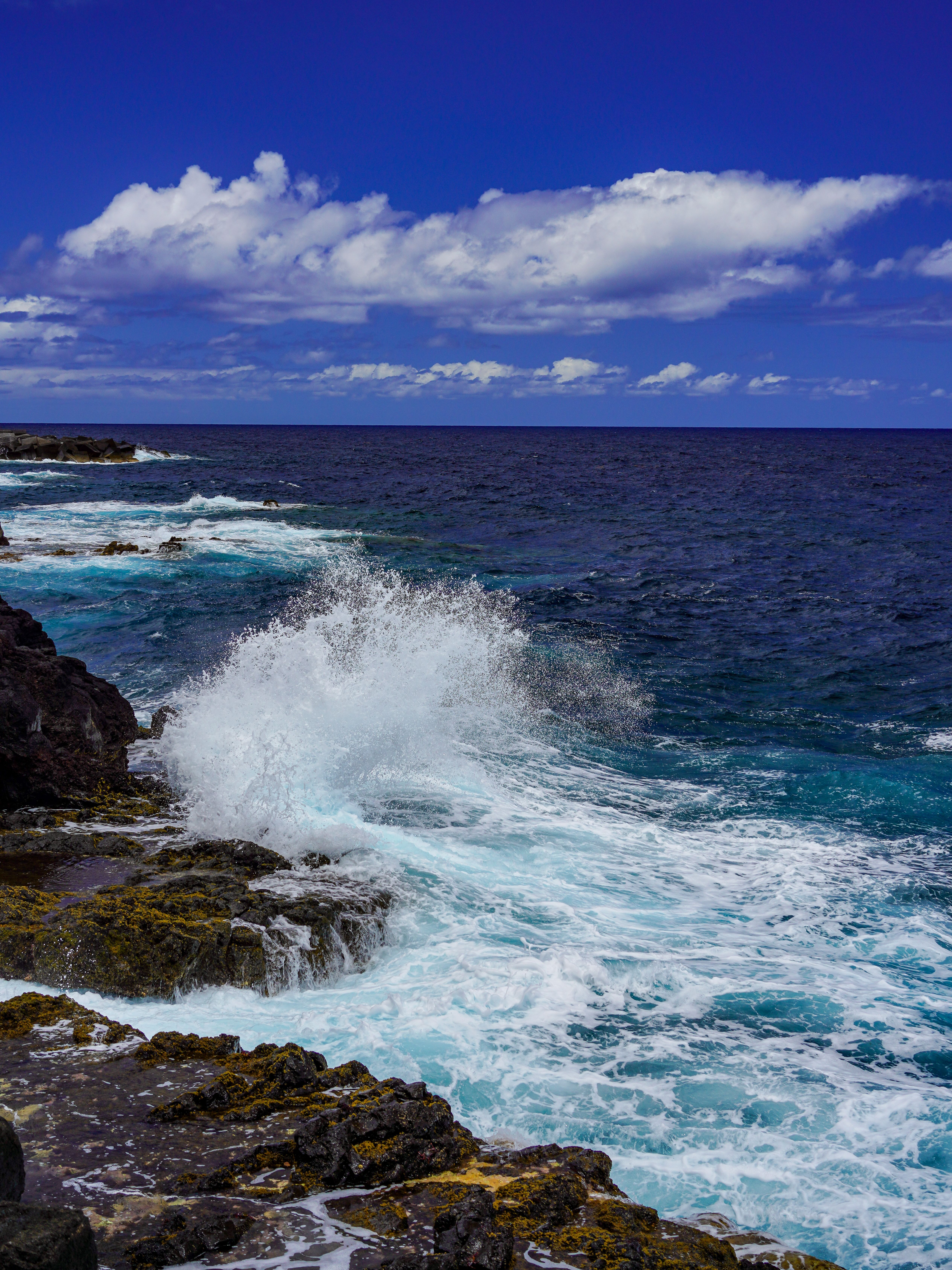 Waves Splashing against Rocky Shore · Free Stock Photo