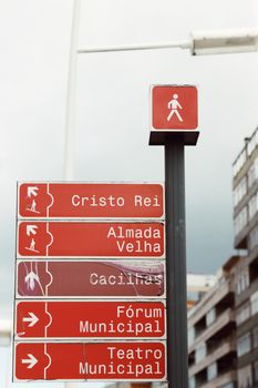 Guidance signs in Lisbon showcasing key landmarks and directions.