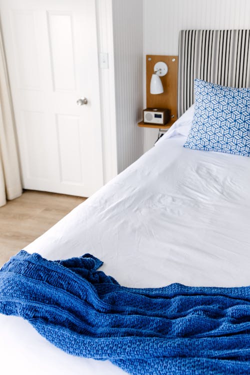 Blue Blanket on Bed