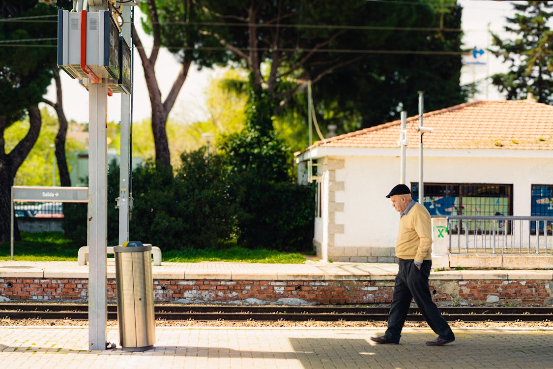 Man Walking at Railway Station