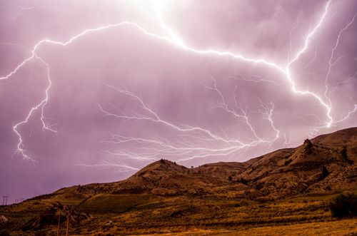 Free Stunning lightning storm over hills in Wenatchee, Washington with striking long exposure. Stock Photo