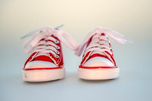 Close-up Photo of Pair of Red Low-top  Baby Sneakers