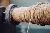 Selective Focus Photography of Brown Rope Roll