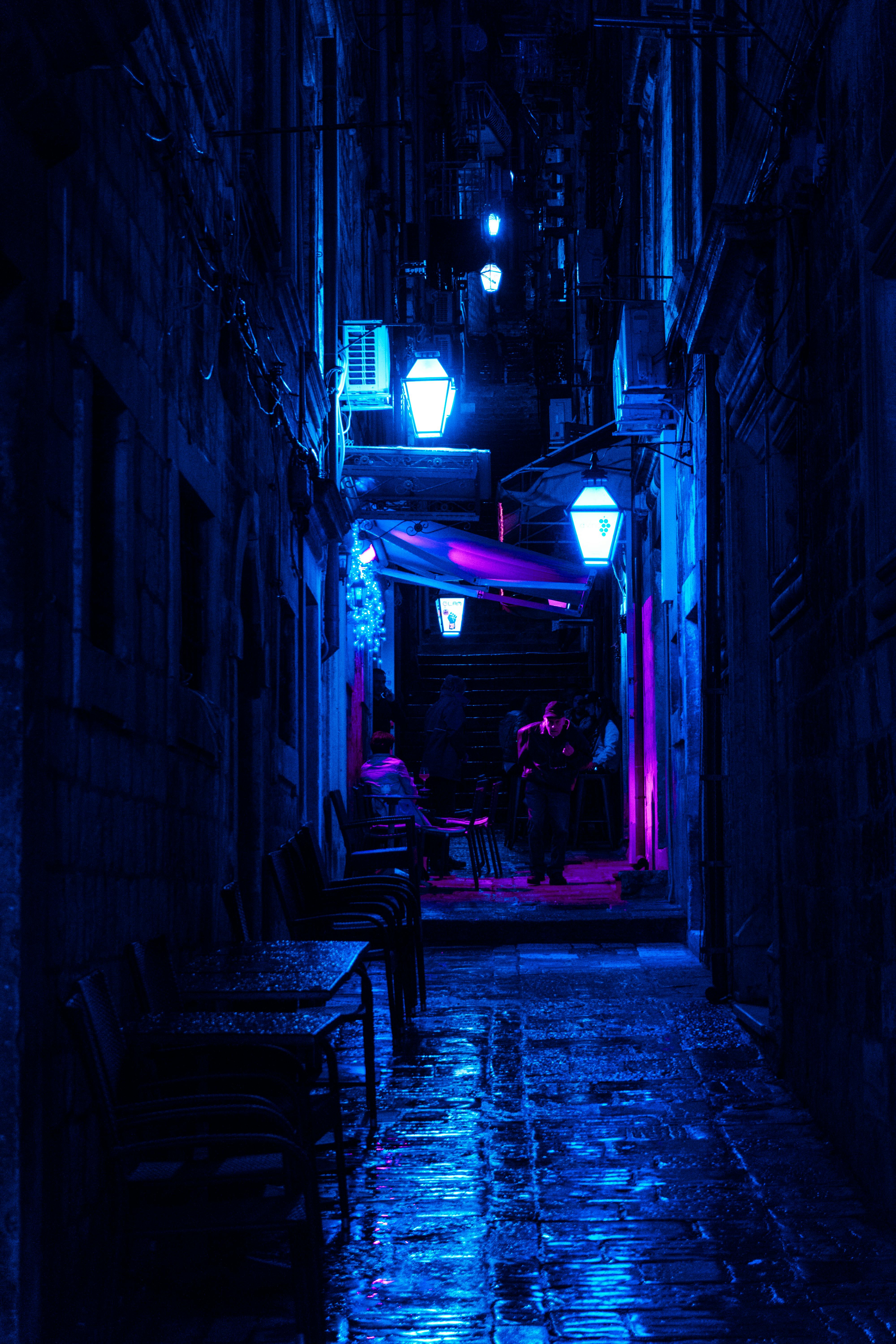 Dark Alley With Turned-on Street Lamps · Free Stock Photo