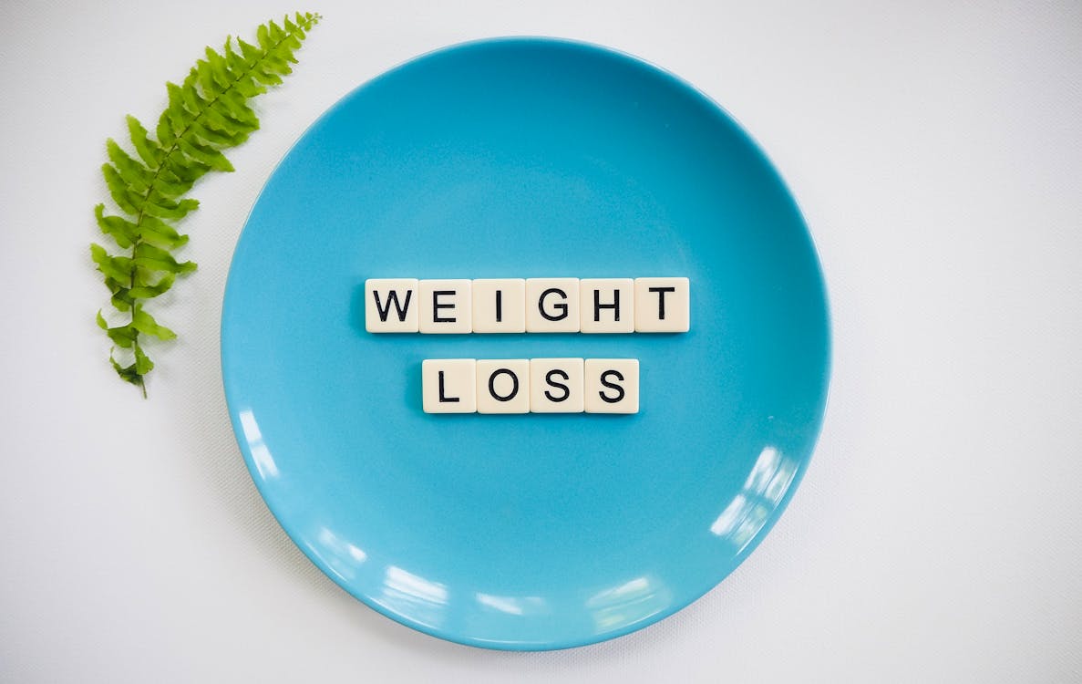 Scrabble Pieces On A Plate saying weight loss