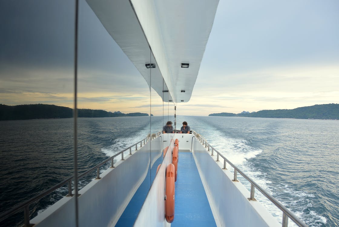 Person Sitting on Boat