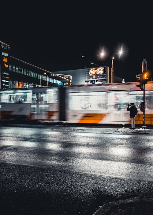 Long Exposure Photography of White and Yellow Train