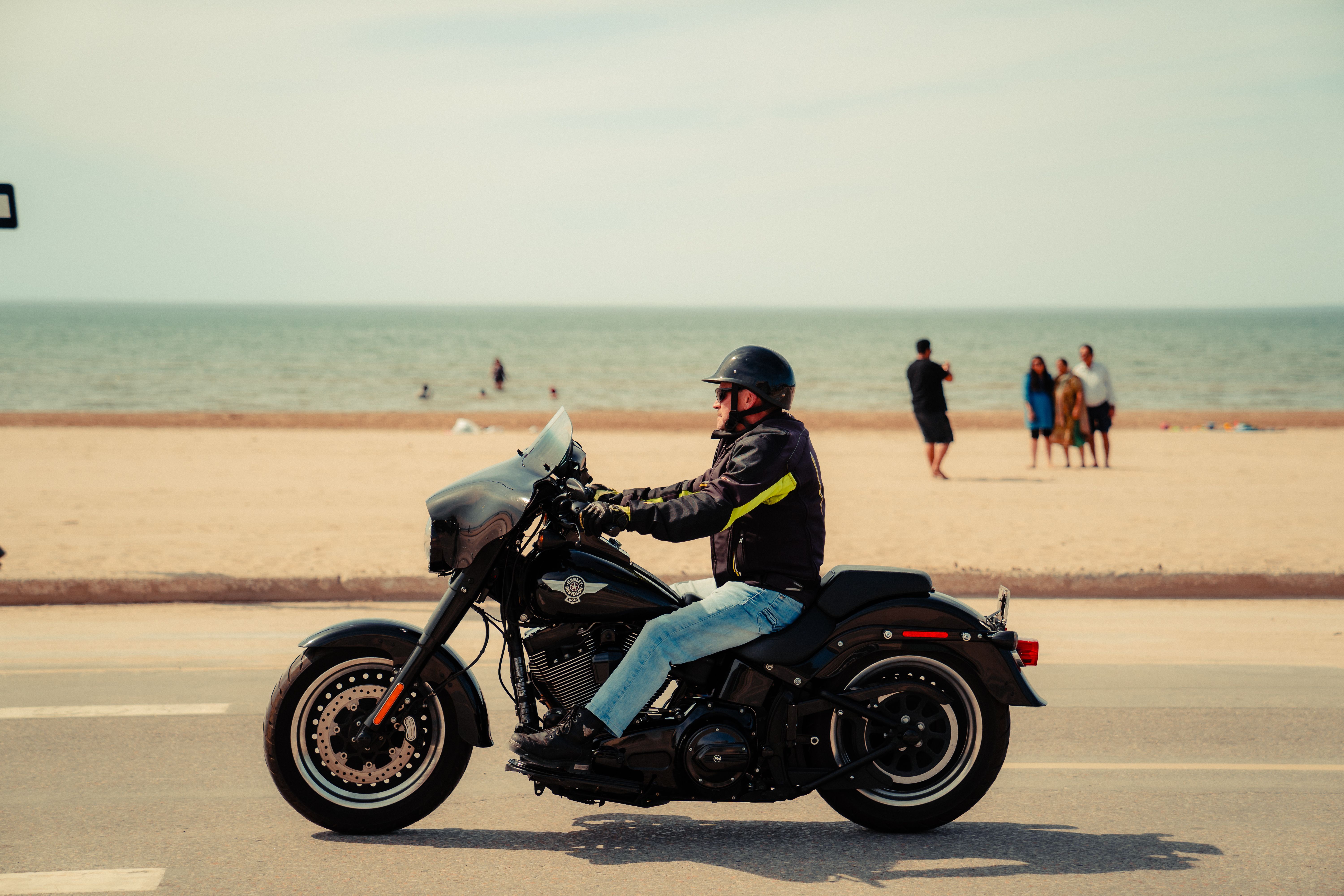Man Riding Motorcycle on Road · Free Stock Photo