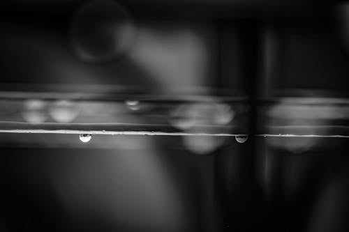 Black and White Photo of Water Drop