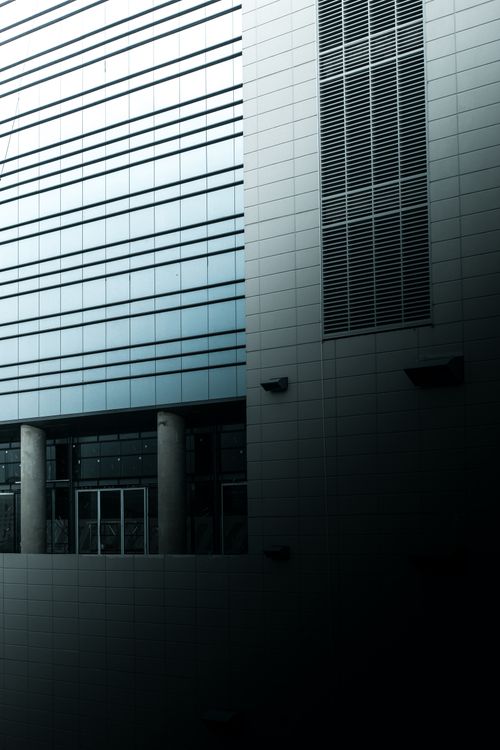 Free Contemporary building facade with vertical lines and shadows in Bandung, Indonesia. Stock Photo
