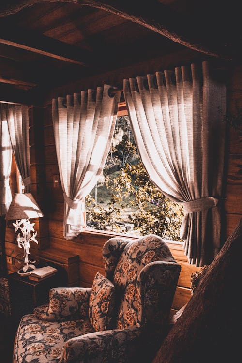 Brown and Gray Armchair Near Window