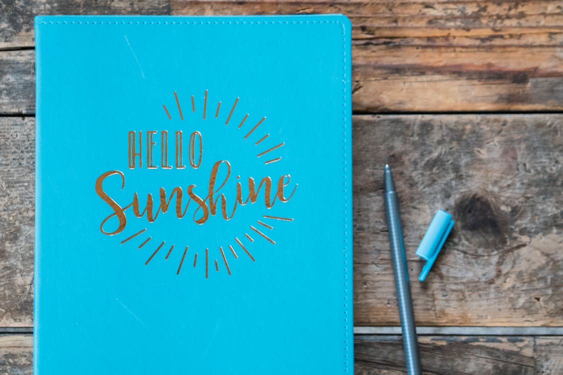 Free Close-Up Photo of Hello Sunshine Book Stock Photo