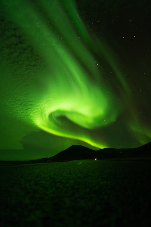 Free Green Light of Aurora Borealis at Night Stock Photo