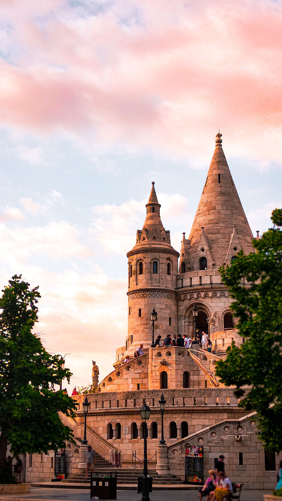 The white stone towers of Fisherman's Bastion on Castle Hill in Budapest at sunset