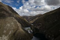 Brown Mountains Under White Clouds