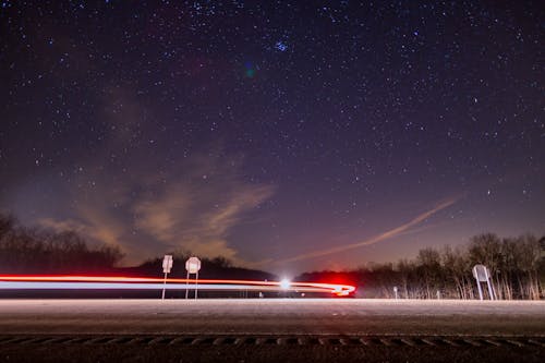 Free Time-Lapse Photography of Car on Road Stock Photo