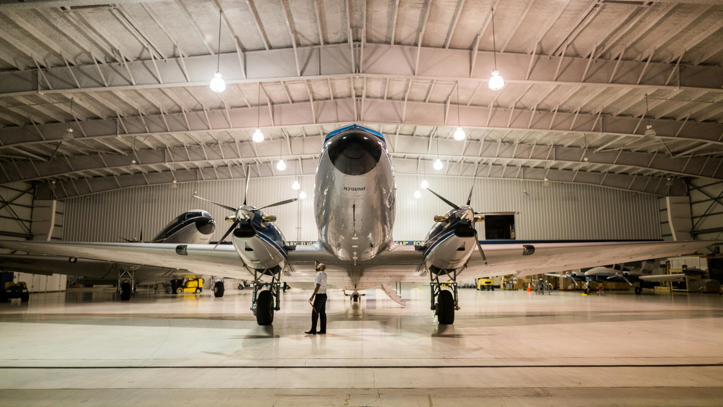 Download Gray Plane Inside Hangar · Free Stock Photo