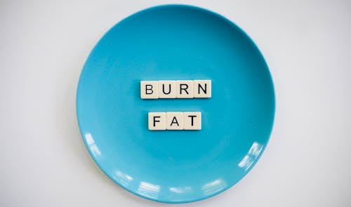 Foto Eines Burn Fat Text Auf Runder Blauer Platte