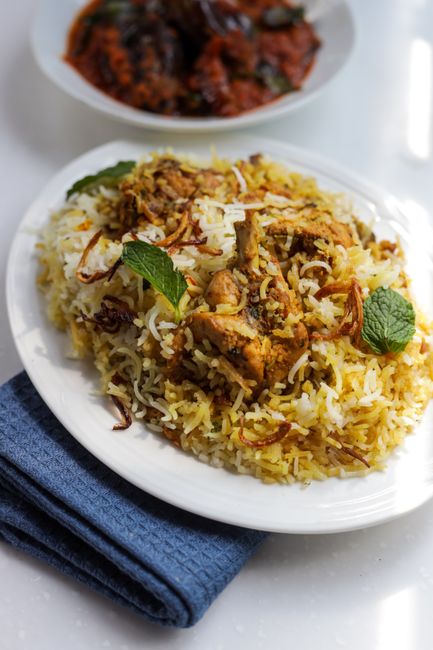 Chicken biryani garnished with mint