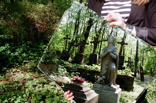 Free A creative cemetery image using a mirror to reflect graves and a statue, captured outdoors. Stock Photo