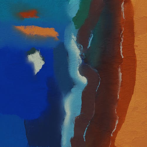 An abstract painting with orange, blue and green colors