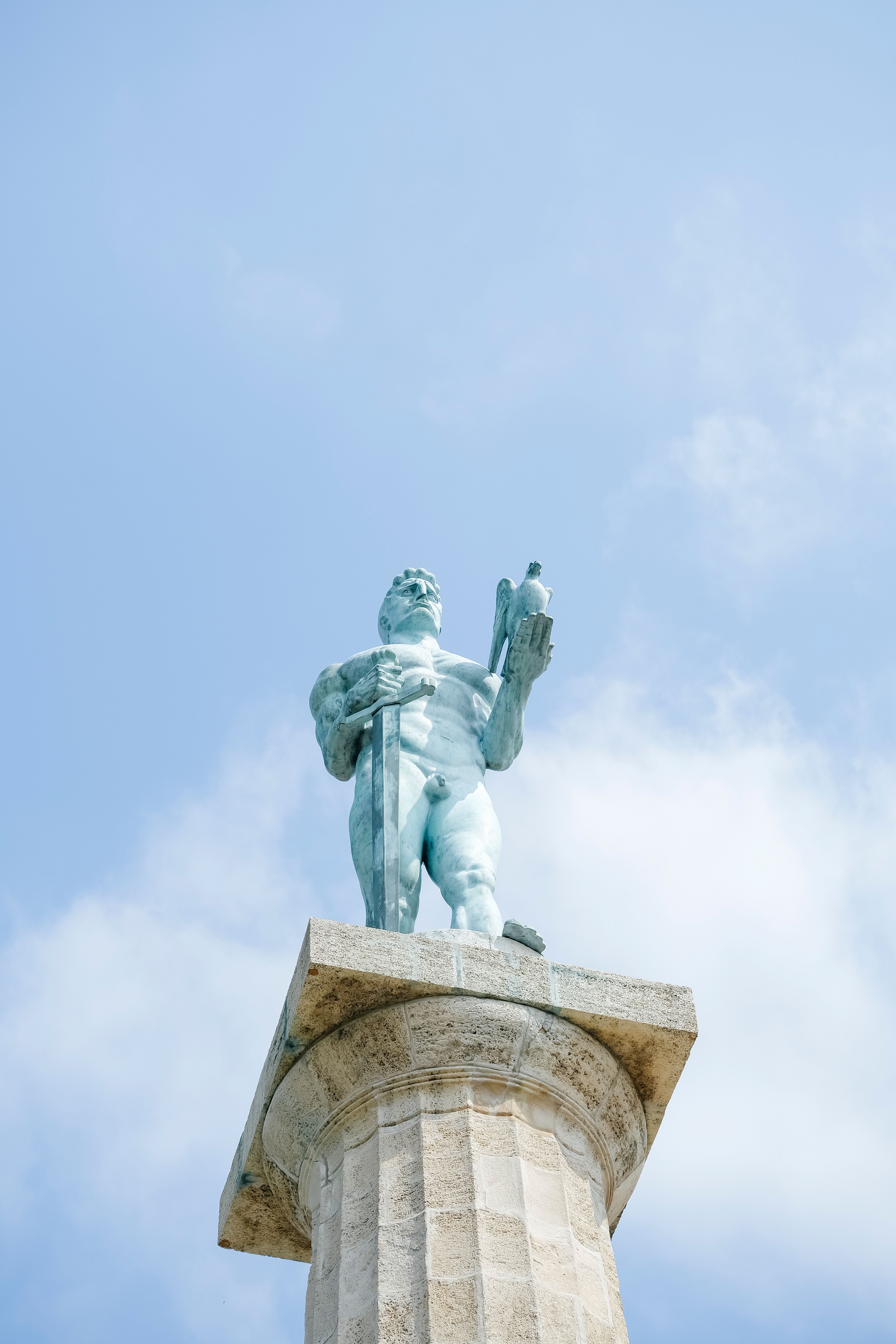 Discover the iconic 'The Victor' monument in Belgrade against a cloudy sky.