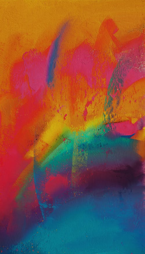 An abstract painting with bright colors and a rainbow