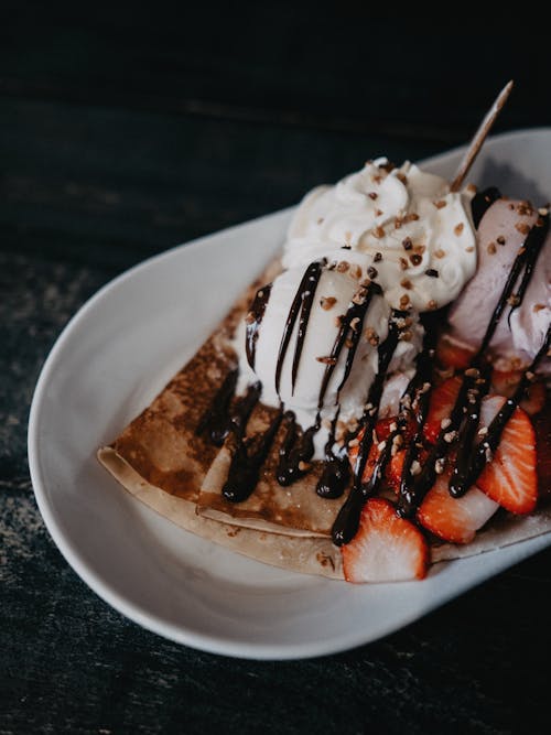 Free Crepes with Ice Cream and Strawberries Stock Photo