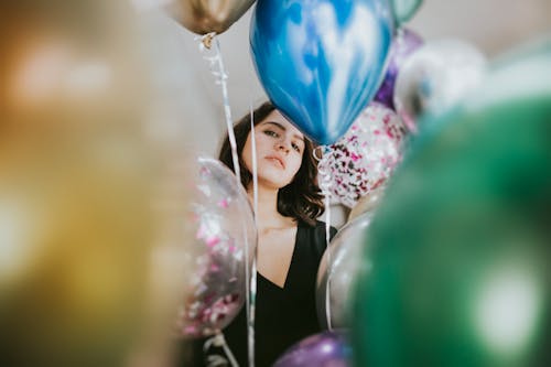 Free Woman Standing Near Balloons Stock Photo