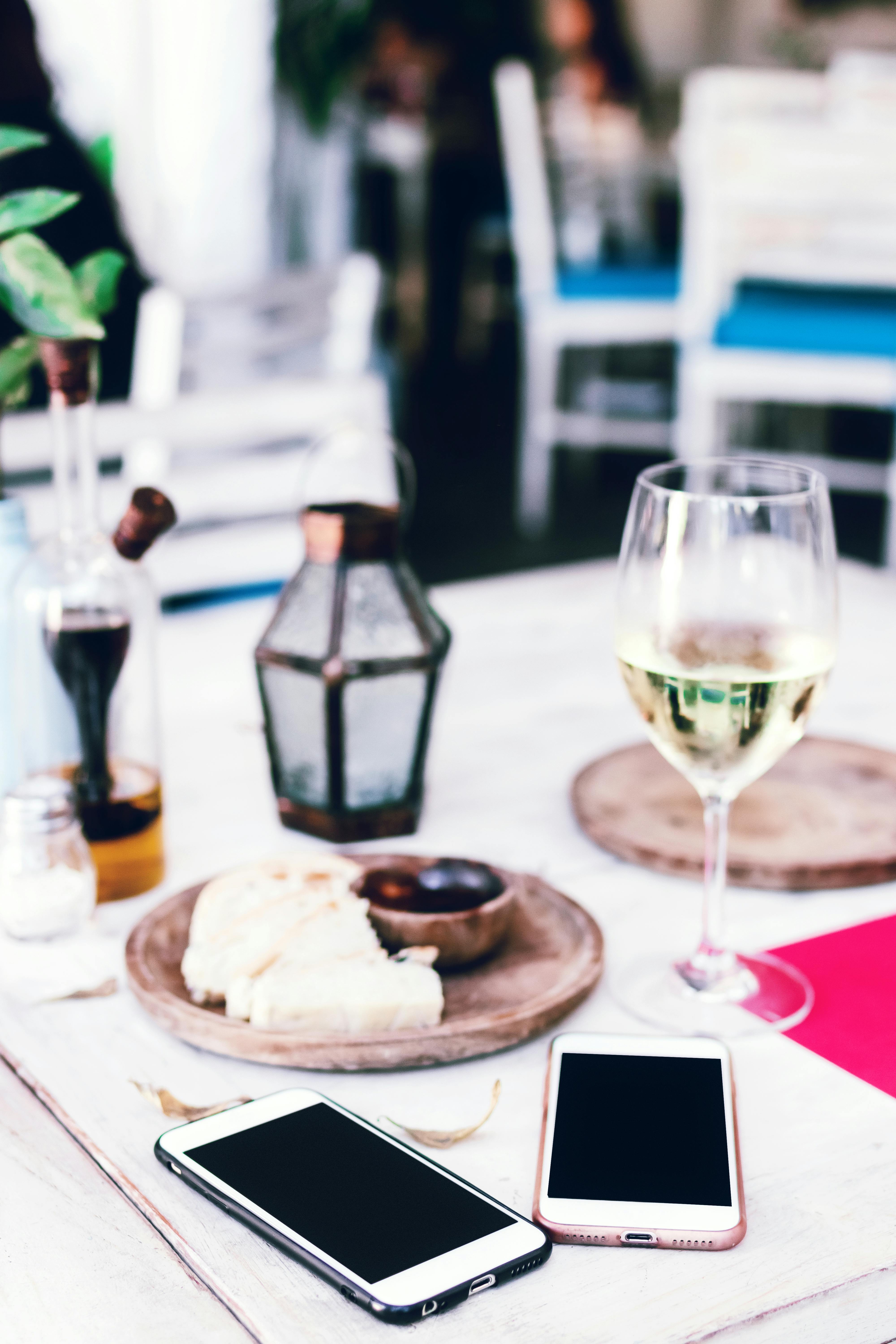 Group of People Sitting on Dining Table · Free Stock Photo