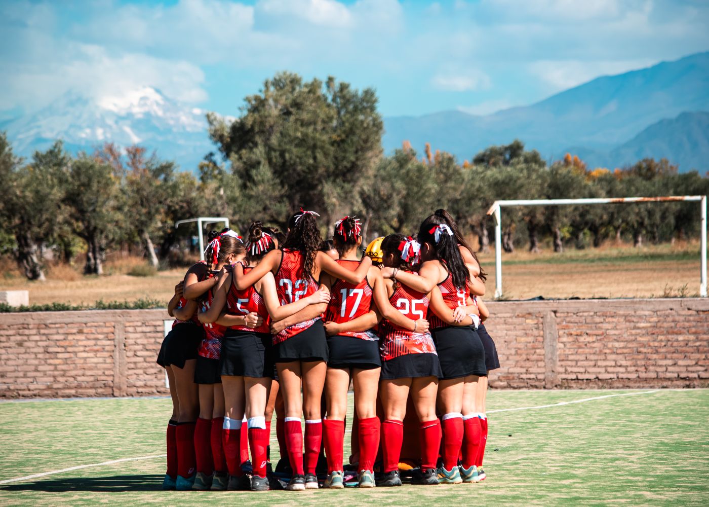Team standing together in custom uniforms
