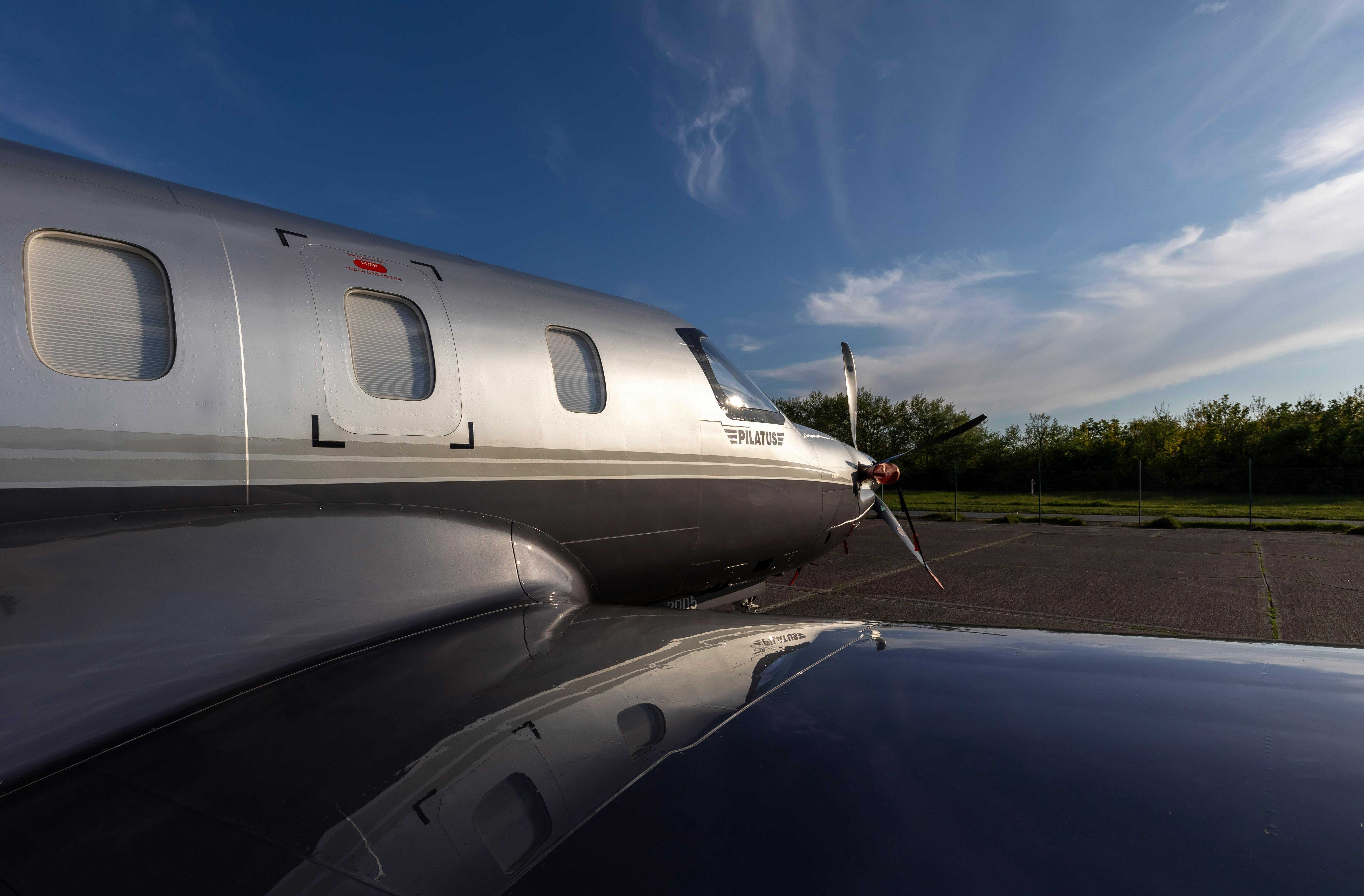 view of small silver aircraft from its wing