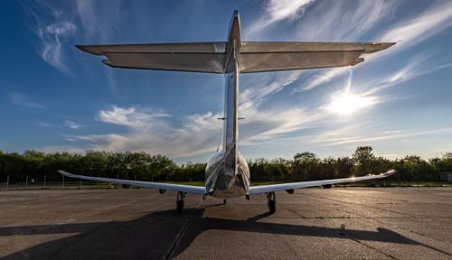 Free A stationary airplane at sunset on the tarmac at Sylt Airport, Germany. Stock Photo