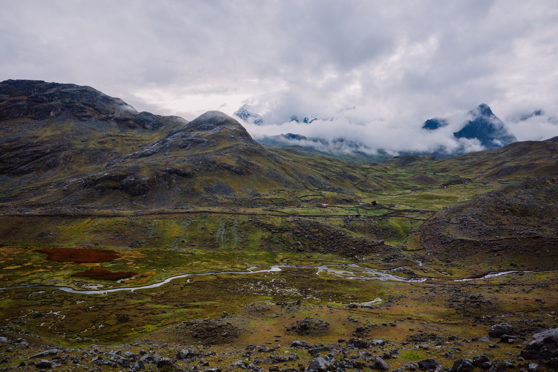 Stunning mountain landscape in Pajchanta, Peru, showcasing rolling hills and clouds.