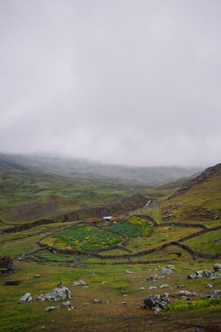 Serene rural landscape in Pajchanta, Peru with rolling hills and cloudy sky, ideal for nature lovers.