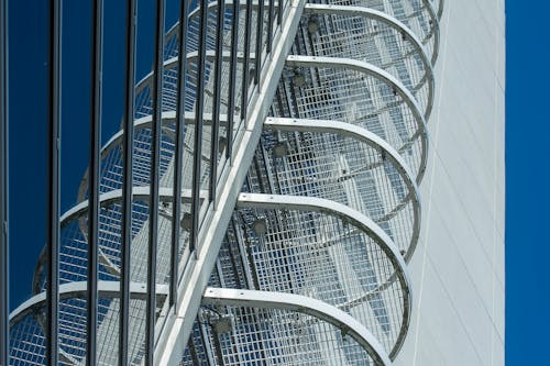A close up of a metal spiral staircase