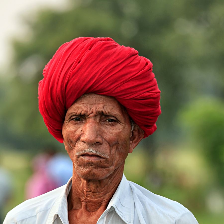 Elderly Rajasthani man with red turban — photo by Nishant Aneja