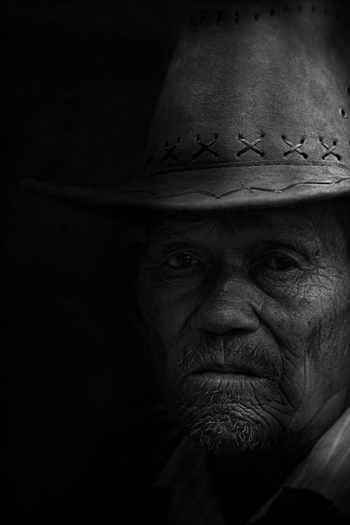 Free Monochrome Photo of Man Wearing Cowboy Hat Stock Photo