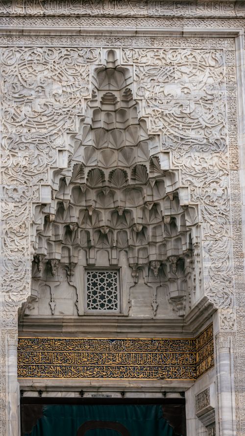 Free Detailed view of the ornate entrance to the Green Mosque in Bursa, Türkiye, showcasing Islamic architectural artistry. Stock Photo