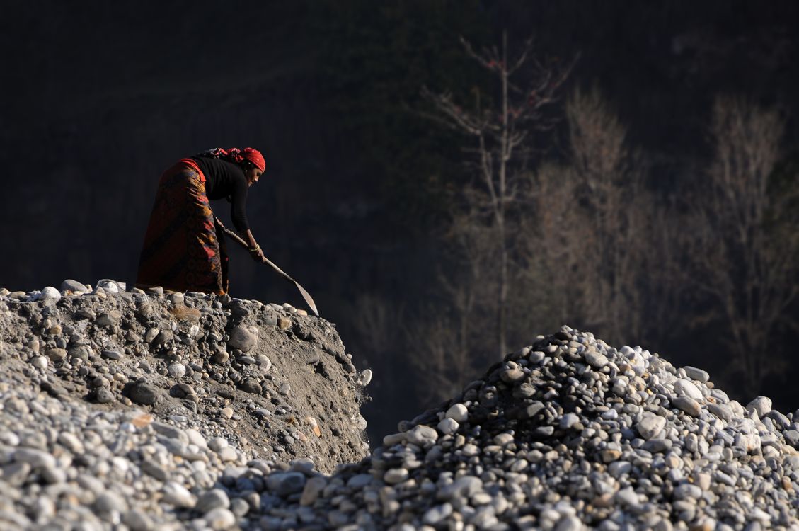 Backbreaking Work Woman Working in Sand Mining in Nepal · Free Stock Photo