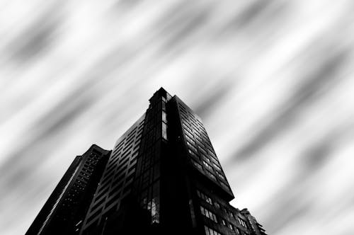 High Rise Building with Moving Clouds