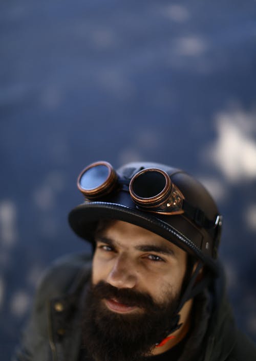 Man Wearing Black Helmet With Brass Goggles