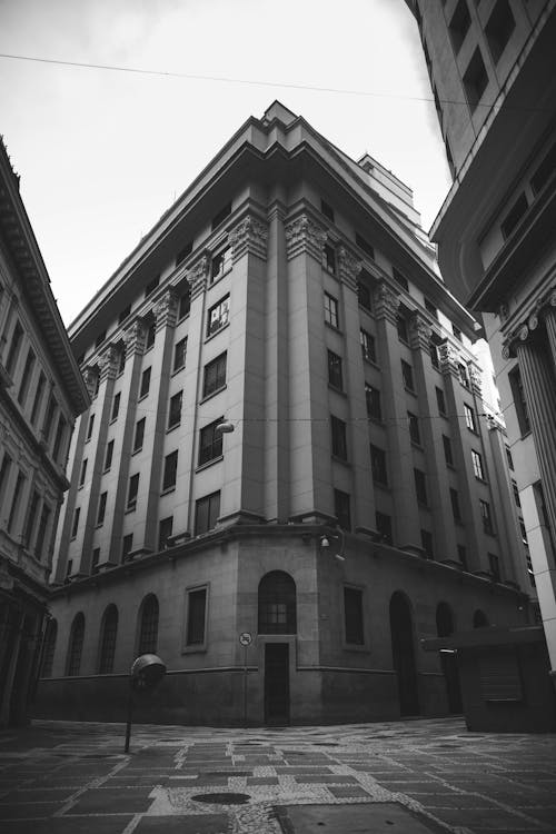 Worms-eye View of a Gray Concrete Buildings