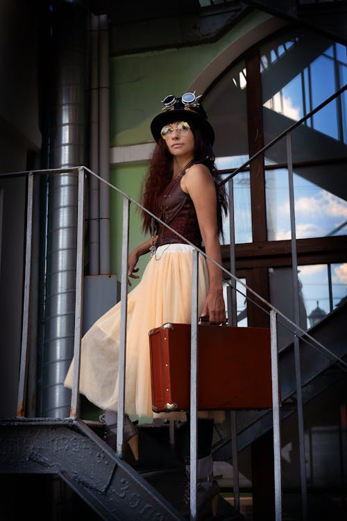 Free Woman Standing on Stairs Stock Photo