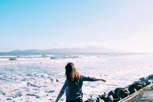 Woman By The Sea