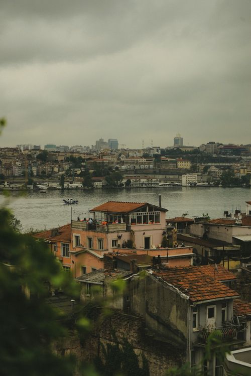Free Scenic view of Istanbul's rooftops against a river backdrop, highlighting the city's urban beauty. Stock Photo